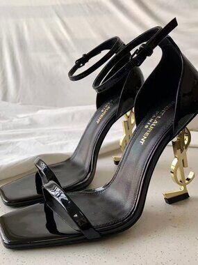 SAINT LAURENT OPYUM Sandals in Black Patent Leather with Cassandre Logo Heel